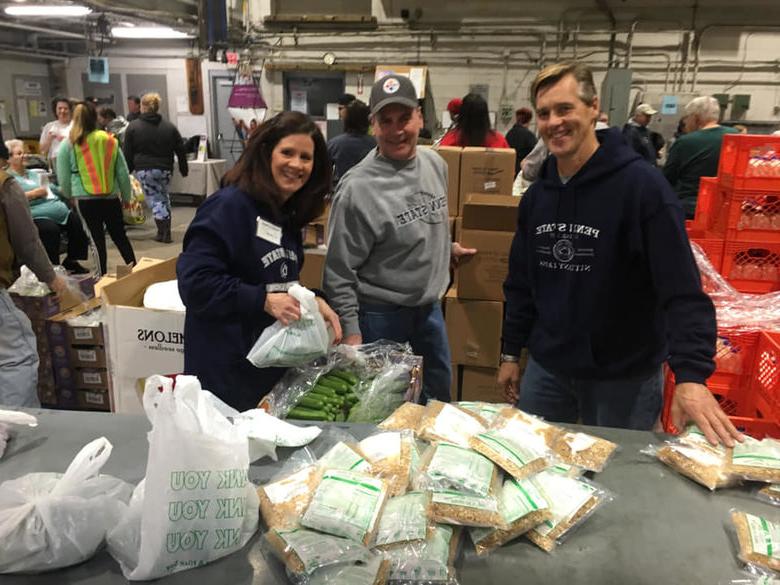 Alumni Working at Food Pantry